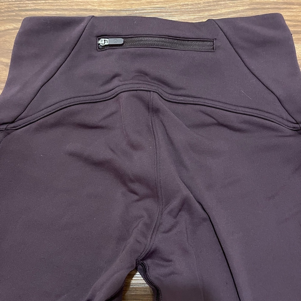 Lululemon Fast As Fleece Tight
Black Cherry Womens Size 4
Reflective Pocket - Picture 9 of 14